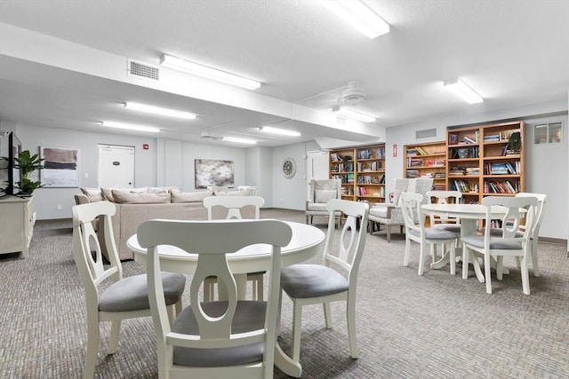 dining area featuring carpet floors