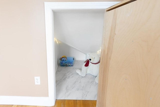 interior space featuring vaulted ceiling