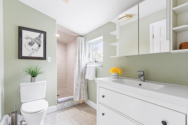 full bath featuring toilet, vanity, a shower stall, tile patterned floors, and radiator heating unit