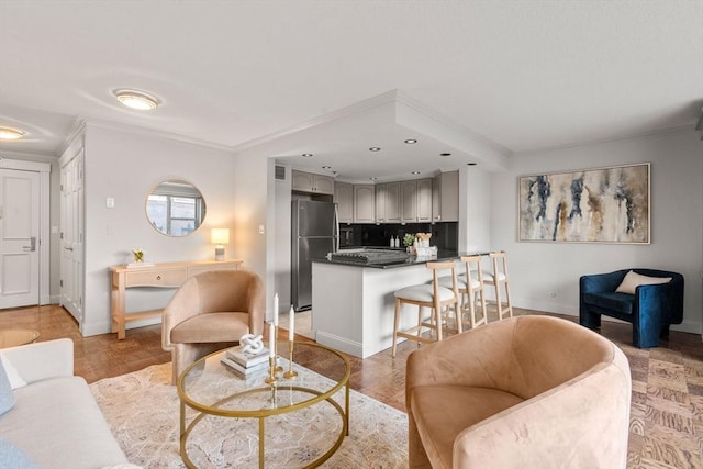 151 Tremont St Unit 8S, Boston, MA 02111 - living area featuring crown molding, baseboards, and recessed lighting