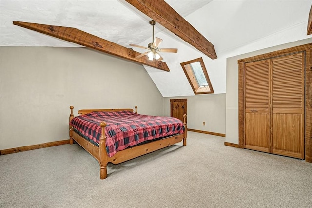 bedroom featuring lofted ceiling with beams, light carpet, and ceiling fan