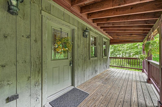 entrance to property with covered porch