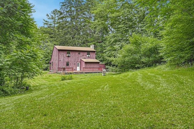 view of yard featuring a wooden deck