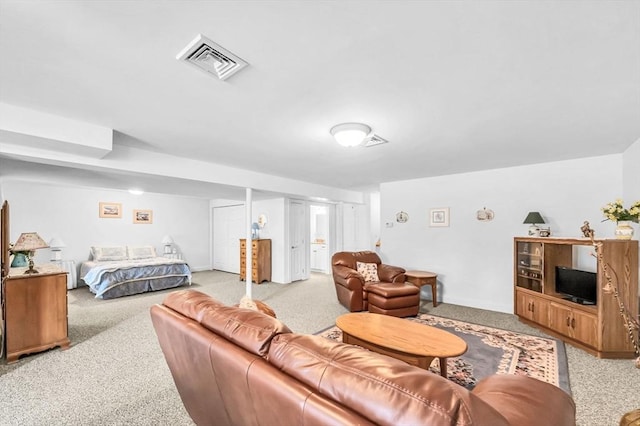 bedroom with light colored carpet