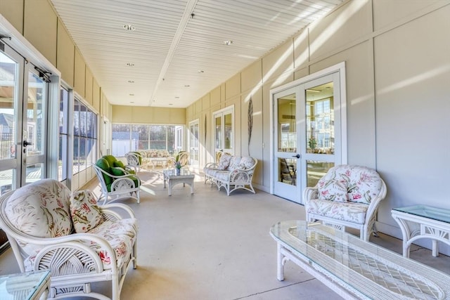 sunroom featuring french doors