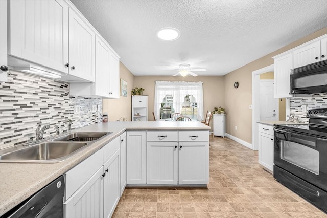 kitchen featuring white cabinets, sink, and black appliances