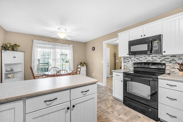 kitchen with tasteful backsplash, ceiling fan, white cabinets, and black appliances