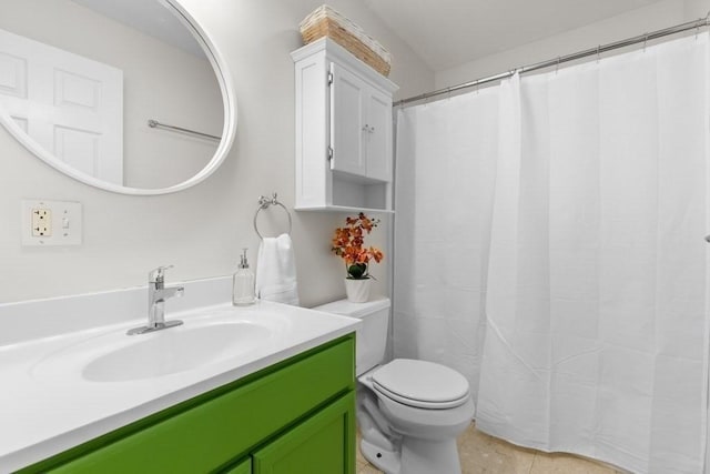 bathroom featuring vanity, tile patterned flooring, toilet, and curtained shower