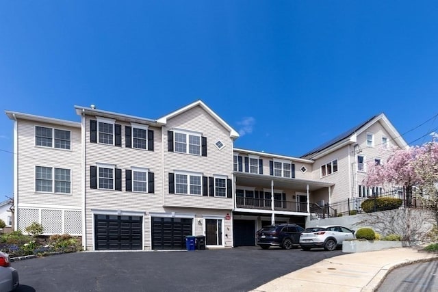 exterior space featuring an attached garage and driveway