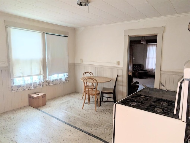 5 Hall St, Webster, MA 01570 - dining space featuring a wainscoted wall and ornamental molding