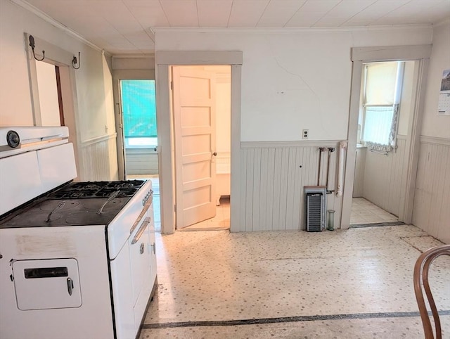 5 Hall St, Webster, MA 01570 - kitchen featuring ornamental molding, a wainscoted wall, and white cabinets