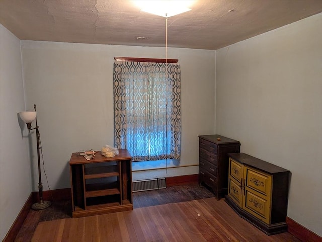 5 Hall St, Webster, MA 01570 - living area with hardwood / wood-style flooring and baseboards
