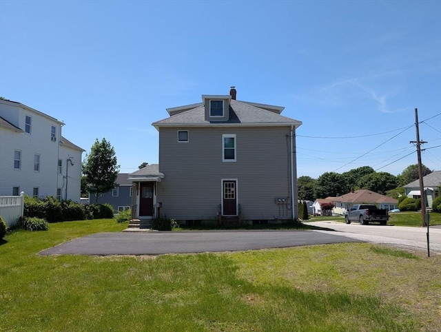 5 Hall St, Webster, MA 01570 - rear view of property featuring a yard and a chimney