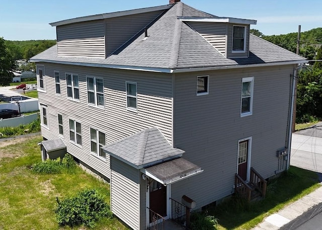 5 Hall St, Webster, MA 01570 - view of property exterior with entry steps, a chimney, and a shingled roof