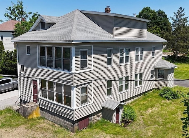 5 Hall St, Webster, MA 01570 - back of house with a chimney, roof with shingles, a yard, and entry steps