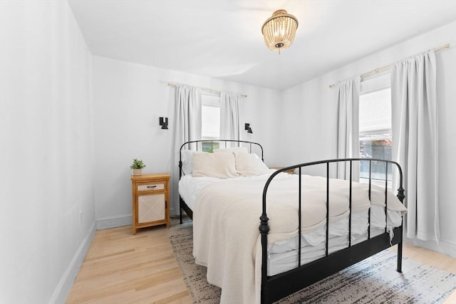 633 Lagrange St, Boston, MA 02132 - bedroom featuring light wood-style floors and baseboards