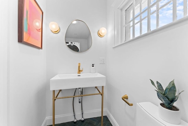 633 Lagrange St, Boston, MA 02132 - half bathroom with baseboards and toilet