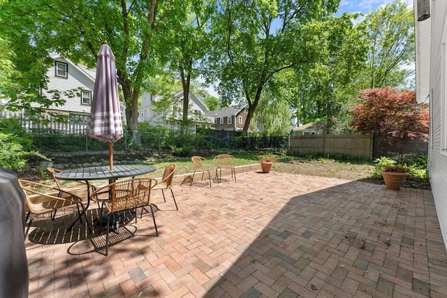 633 Lagrange St, Boston, MA 02132 - view of patio with a fenced backyard and outdoor dining area