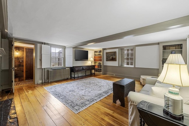 6 Lee St, Marblehead, MA 01945 - living area with radiator heating unit and hardwood / wood-style floors