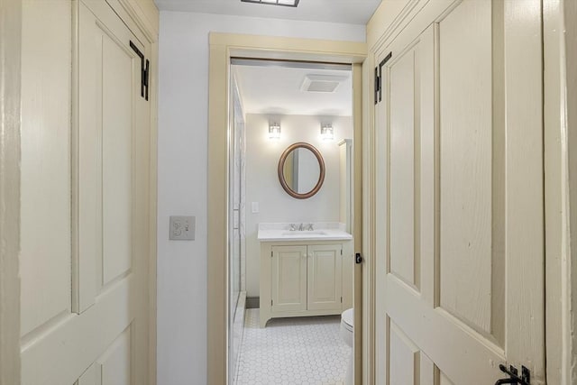 6 Lee St, Marblehead, MA 01945 - bathroom with toilet, vanity, tile patterned floors, and baseboards