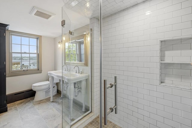 6 Lee St, Marblehead, MA 01945 - full bathroom with a shower stall, a baseboard radiator, and toilet