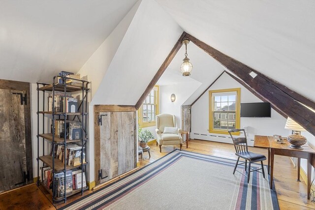 6 Lee St, Marblehead, MA 01945 - home office with a baseboard radiator, hardwood / wood-style floors, and vaulted ceiling