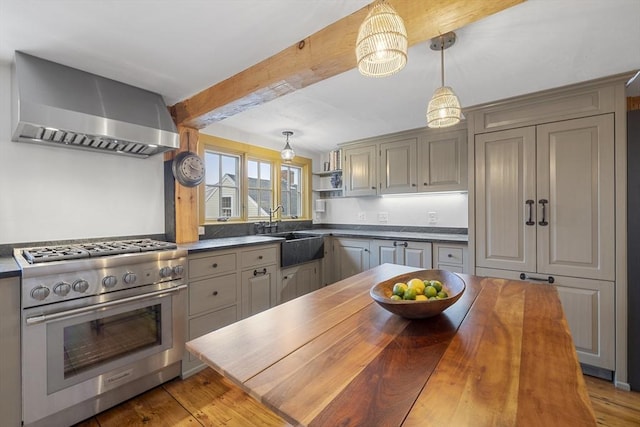 6 Lee St, Marblehead, MA 01945 - kitchen with wall chimney exhaust hood, high end stainless steel range oven, a sink, beamed ceiling, and open shelves