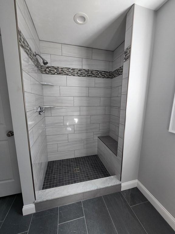 138 Elm St, Uxbridge, MA 01569 - bathroom featuring a shower stall, baseboards, and tile patterned flooring