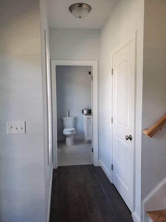 138 Elm St, Uxbridge, MA 01569 - corridor with dark wood-type flooring and baseboards