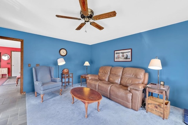 living room with a ceiling fan