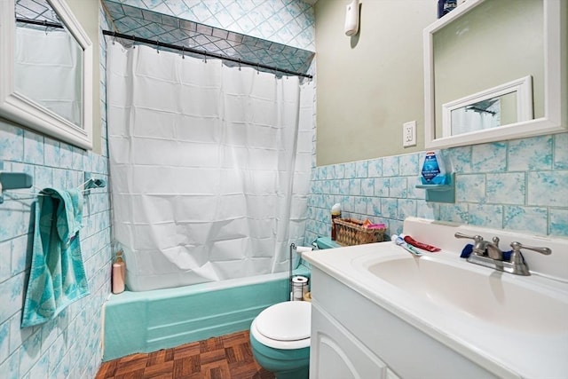 full bathroom featuring parquet flooring, toilet, tile walls, vanity, and shower / bath combination with curtain