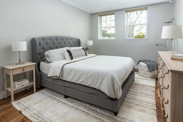 126 Amory St Unit B4, Brookline, MA 02446 - bedroom with wood finished floors, ornamental molding, and baseboards