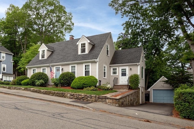 136 Walnut St, Braintree, MA 02184 - cape cod home with an outbuilding, a detached garage, roof with shingles, entry steps, and a chimney