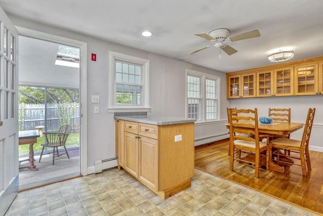 7 Burton Ave, Harwich, MA 02671 - kitchen with a baseboard heating unit, glass insert cabinets, baseboards, and recessed lighting