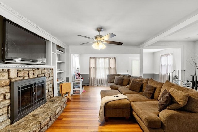 274 Primrose, Fall River, MA 02720 - living area featuring plenty of natural light, ceiling fan, wood finished floors, and a fireplace