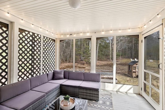 sunroom / solarium with track lighting