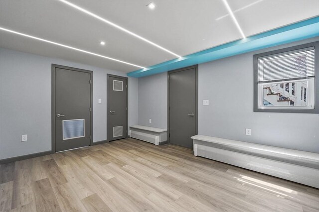 spare room featuring recessed lighting, baseboards, visible vents, and light wood-style floors
