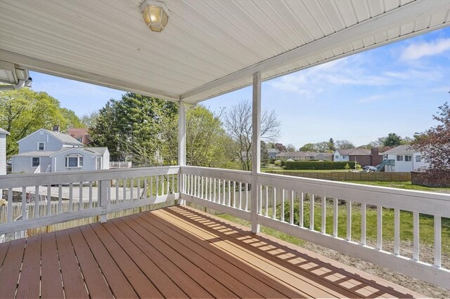 wooden deck featuring a residential view