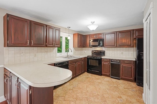 24 Highcrest Park Unit 24, Webster, MA 01570 - kitchen featuring black appliances, a sink, a peninsula, and light countertops