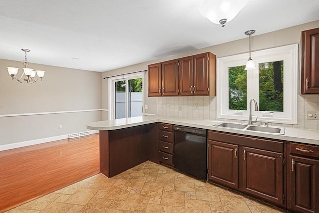 24 Highcrest Park Unit 24, Webster, MA 01570 - kitchen with black dishwasher, a sink, light countertops, and decorative backsplash