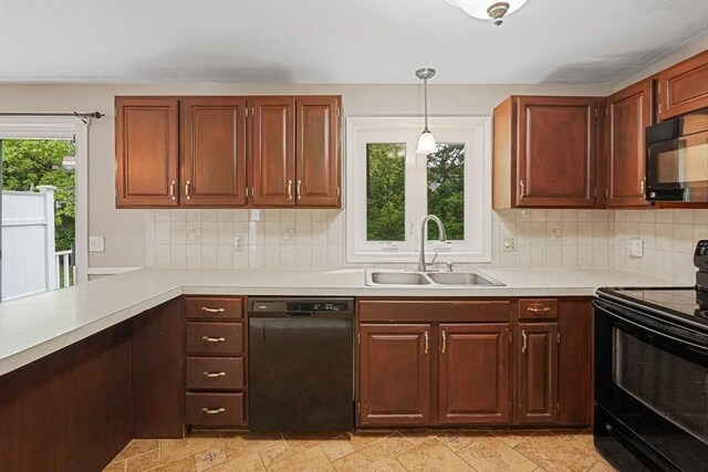 24 Highcrest Park Unit 24, Webster, MA 01570 - kitchen with black appliances, a sink, light countertops, and decorative backsplash