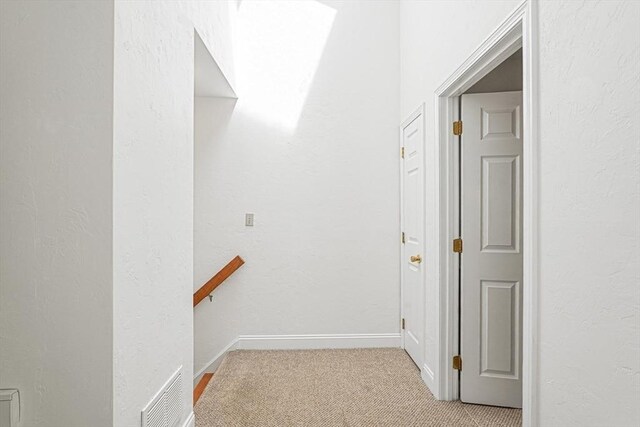 24 Highcrest Park Unit 24, Webster, MA 01570 - hall with light colored carpet and baseboards