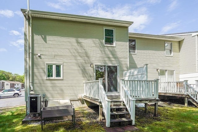 24 Highcrest Park Unit 24, Webster, MA 01570 - back of house with a deck, central air condition unit, and stairs