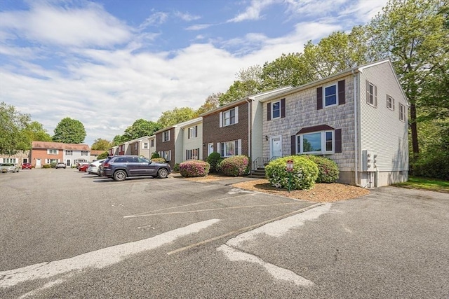 24 Highcrest Park Unit 24, Webster, MA 01570 - view of building exterior featuring uncovered parking