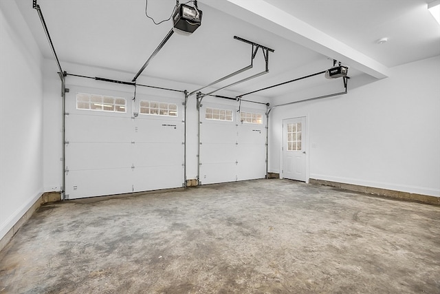 garage featuring a garage door opener