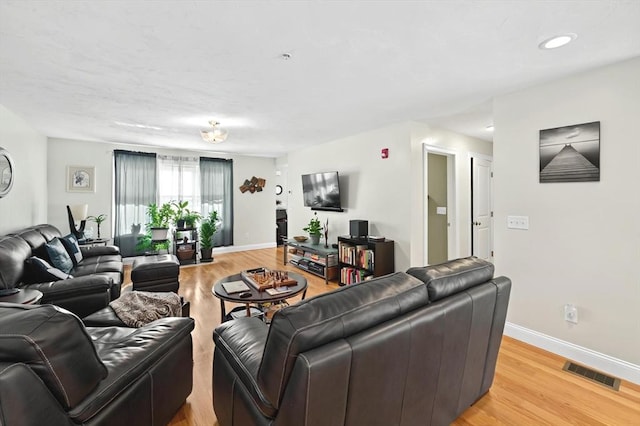 living room with light wood-type flooring