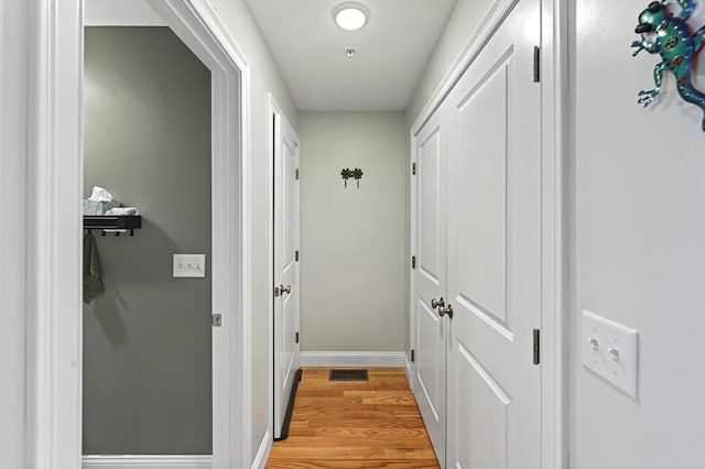 hall featuring light wood-type flooring