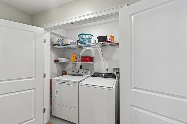 laundry room with washer and dryer