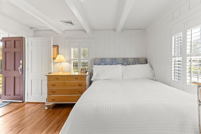 751 Crowell Rd, Chatham, MA 02650 - bedroom with wood finished floors and beamed ceiling