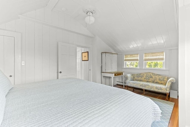 751 Crowell Rd, Chatham, MA 02650 - bedroom featuring lofted ceiling, wood finished floors, and a baseboard radiator